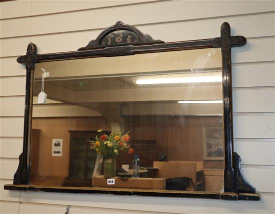A late Victorian aesthetic movement ebonised overmantel mirror W.112cm